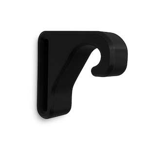 Peut inclure: Un crochet noir mural avec un design incurvé. Le crochet est fait d'un matériau solide et a une surface texturée. Le crochet est conçu pour tenir des objets et est monté sur un mur blanc.