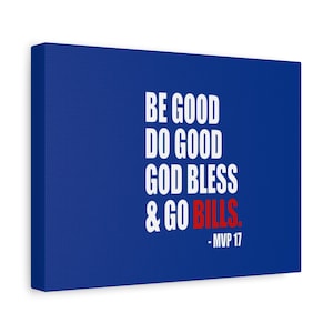 Puede incluir: Una impresión en lienzo azul con texto blanco que dice "Be good, do good, God bless, & go Bills." El texto "Bills" está en rojo. La parte inferior de la impresión tiene el texto "MVP 17."