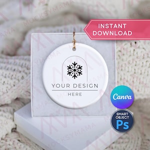 May include: White ceramic ornament with a snowflake design and the text "YOUR DESIGN HERE". The ornament is displayed in a white box with a gold string for hanging. A pink banner reads "INSTANT DOWNLOAD".