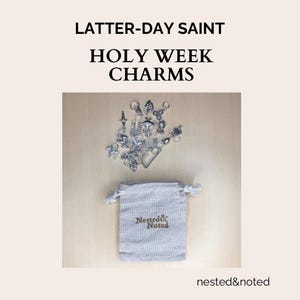 May include: A collection of silver-toned Holy Week charms, including crosses and other religious symbols, displayed with a small gray drawstring bag. The bag is embroidered with the words "Nested & Noted". The text "Latter-Day Saint Holy Week Charms" is at the top.