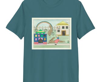 May include: A teal blue t-shirt with a colorful illustration of a girl, two rabbits, a house, and a rainbow. The illustration is framed in a white border.