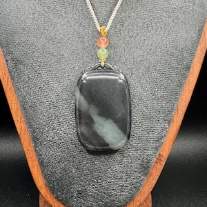 Qing Hua Jade Pendant: Black and White Nephrite, Natural Blessing Talisman