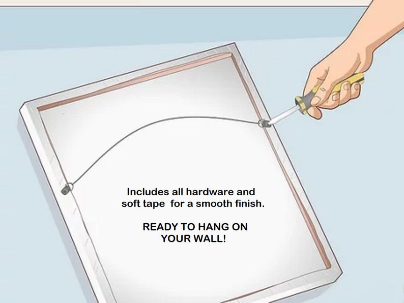 May include: A rectangular framed artwork with a white surface, a wire for hanging, and the text "READY TO HANG ON YOUR WALL!". The frame is silver and a hand is using a screwdriver to secure the wire.