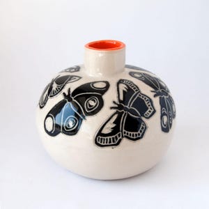 Hand-built, hand-painted vase with butterfly design