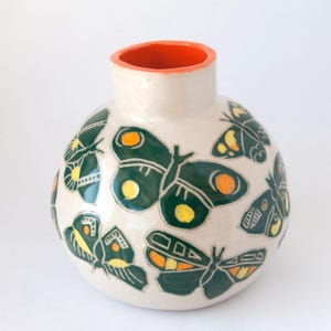 Hand-built, hand-painted vase with butterfly design