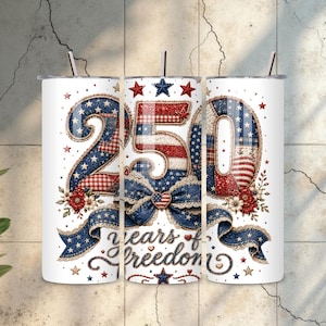 May include: A cylindrical tumbler featuring a white background with a large number 250 in red, white, and blue patterns. Below the number, a blue denim-textured ribbon with white stars and a heart-shaped American flag emblem is displayed.