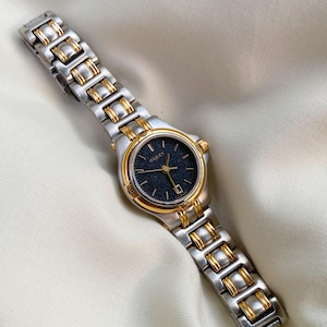 Vintage 90’s Gucci watch with gold and silver tones. Ladies 90s gucci - Gem main image 2