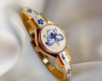 【美品】ANDRE MOUCHE フラワーデザイン バングルウォッチ 美品】ANDRE MOUCHE フラワーデザイン バングルウォッチ ANDRE