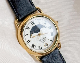 Vintage Alba success Moonphase watch; leather strap, Datejust