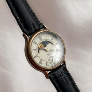 Vintage ALBA Success Sun & Moonphase women’s watch; Subsecond dial, Japanese made