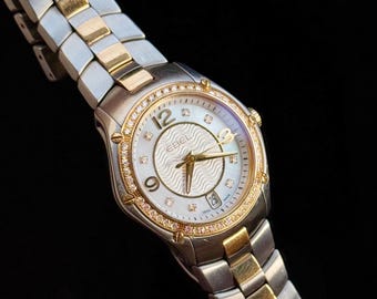 Rare Ebel Classic Sport Watch; 56 Diamonds, 18k Solid gold & stainless steel