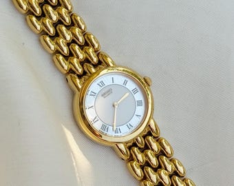 Vintage Peugeot Gold Tone Dainty Cuff Watch With Oval Face  display picture 3