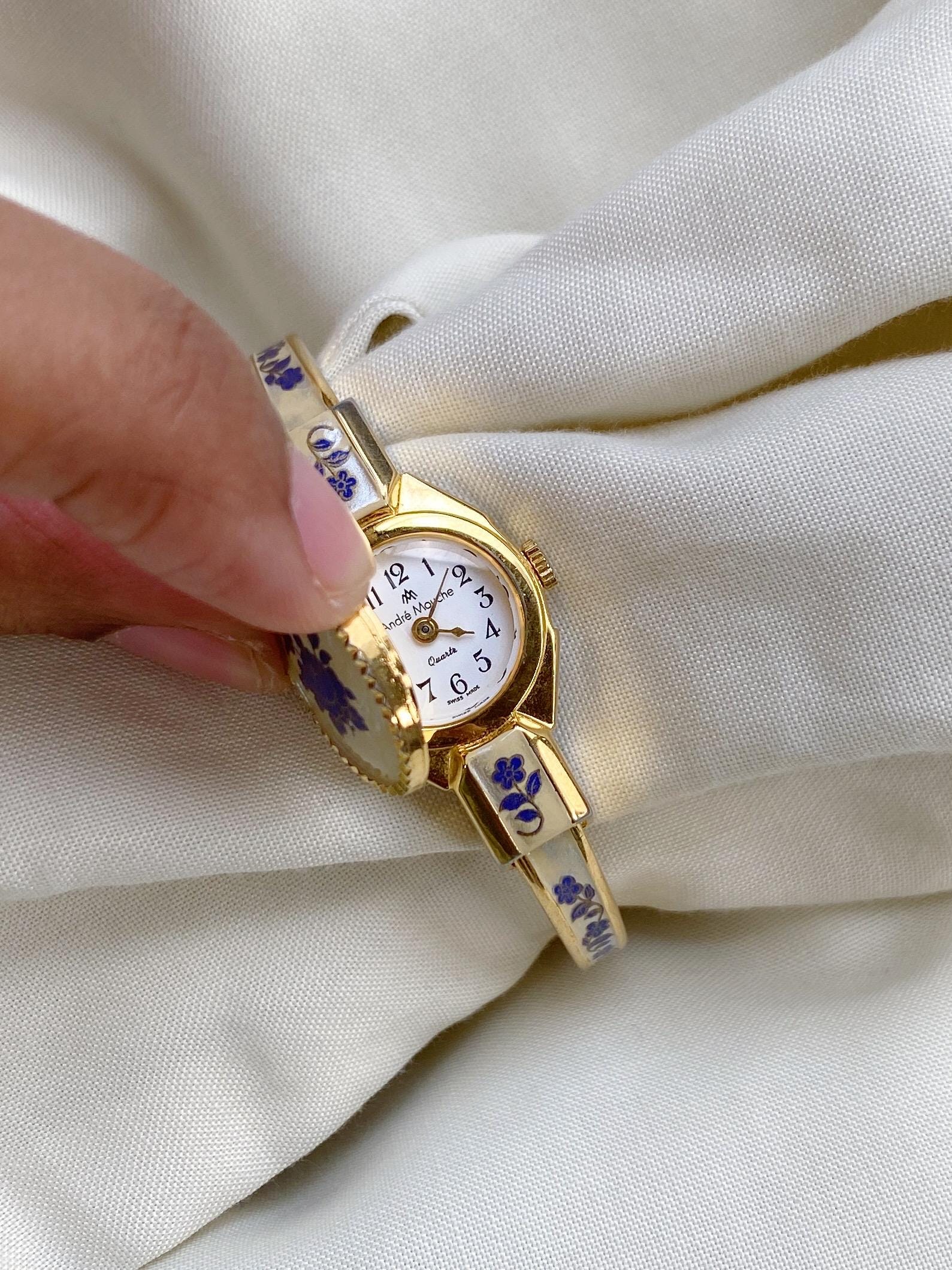Swiss Made ANDRE MOUCHE 花柄 バングルウォッチ Swiss Made ANDRE MOUCHE 花柄 バングルウォッチ - メルカリ