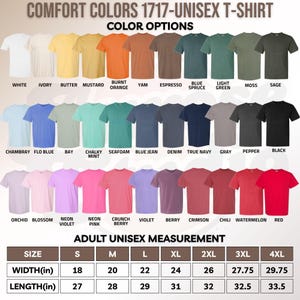 May include: A color chart for Comfort Colors 1717 unisex t-shirts displaying 39 different color options with labels including white, ivory, butter, mustard, orange, yam, espresso, blue spruce, light green, moss, sage, chambray, blue, bay, mint, seafoam, denim, navy, gray, pepper, black, orchid, blossom, violet, pink, berry, crimson, chili, watermelon, and red, plus an adult unisex measurement table in inches.