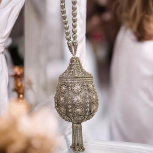Vintage-Style Antique Gold Metal Potli Bag