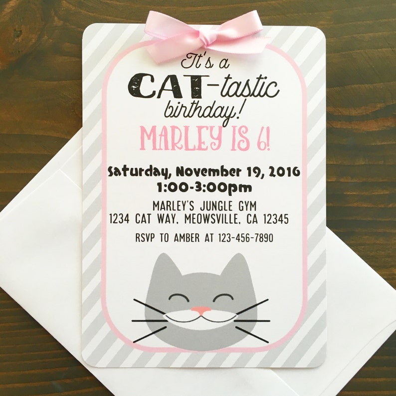 May include: A pink and grey striped invitation with a grey cat illustration. The invitation reads "It's a CAT-tastic birthday! MARLEY IS 6! Saturday, November 19, 2016 1:00-3:00pm MARLEY'S JUNGLE GYM 1234 CAT WAY. MEOWSVILLE, CA 12345 RSVP TO AMBER AT 123-456-7890"