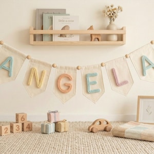 May include: A rustic wooden sign with the text "Welcome to our home" in white lettering. The sign features a distressed finish and a simple, inviting design, perfect for a front porch or entryway.