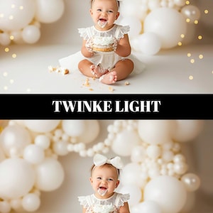 May include: A baby in a white dress and bow headband, covered in cake frosting, smiles while holding a small cake. The background features white balloons and fairy lights. The text "TWINKE LIGHT" is displayed.