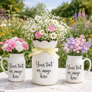 May include: Three white ceramic vases with floral arrangements. The vases have the text "Your text or image here". The flowers include daisies, pink carnations, and purple and pink blossoms. A yellow ribbon adorns the center vase.
