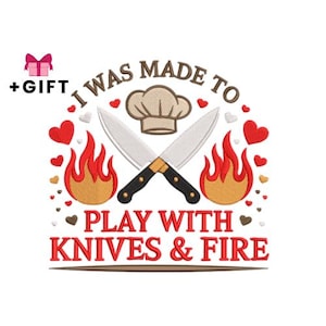 May include: Embroidered design with crossed knives, flames, and a chef's hat. The text reads "I WAS MADE TO PLAY WITH KNIVES & FIRE." Red hearts and the word "GIFT" with a bow are also included.