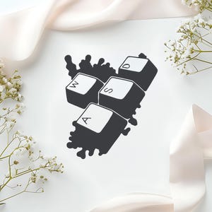 Peut inclure: Graphique noir et blanc repr&eacute;sentant quatre touches de clavier d'ordinateur : A, S, D et W. Les touches sont regroup&eacute;es, sur une forme sombre et irr&eacute;guli&egrave;re. Le fond est blanc, avec des &eacute;l&eacute;ments floraux et un ruban fluide.