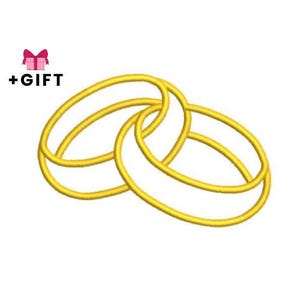 Könnte beinhalten: Ein goldfarbenes, ineinander verschlungenes Ringdesign, möglicherweise für eine Hochzeit oder ein Versprechen. Das Bild enthält ein rosa Geschenkbox-Symbol mit dem Text "+GIFT" in Schwarz, was auf eine Geschenkoption hindeutet.