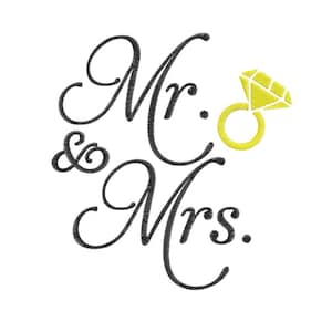 May include: Black embroidered text reads "Mr. & Mrs." with a yellow diamond ring graphic on a white background. The design is likely for wedding or engagement-themed products.