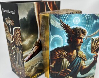 May include: A tarot card deck with a box featuring the text "know thyself" and a depiction of a winged figure. The deck includes a box with the text "Hermes Tarot" and an illustration of a man with wings. The edges of the cards are gold.