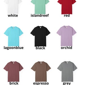 May include: Nine solid-color t-shirts in white, islandreef, red, lagoonblue, black, orchid, brick, espresso, and grey. Each shirt has a crew neck and short sleeves. The color of each shirt is labeled below.
