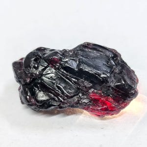 May include: A set of three ceramic mugs with a speckled, matte finish. The mugs are in shades of cream, light gray, and dark gray. Each mug has a simple, minimalist design, perfect for coffee or tea.