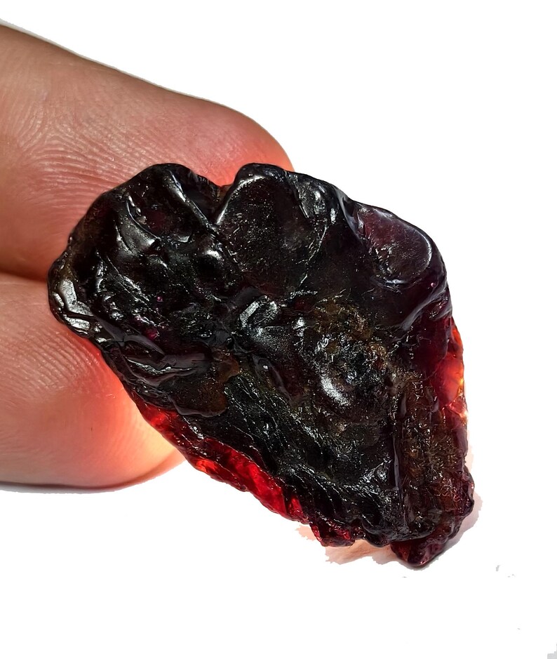 May include: A white ceramic mug with a black handle and the text "But First, Coffee" in a bold, black font. The mug is sitting on a wooden surface. The mug is approximately 4 inches tall.