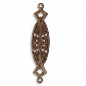 May include: A decorative metal pendant with an oval shape and intricate filigree design. The pendant has a brown antique finish and two loops at the top and bottom.