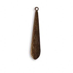 May include: A long, narrow, bronze-colored pendant with a floral design. The pendant has a loop at the top for attaching a chain.