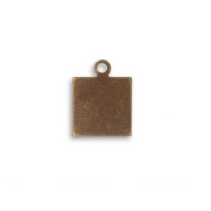 May include: A square-shaped metal charm with a loop at the top. The charm is a light bronze color.