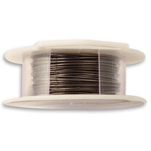 May include: A spool of black wire in a clear plastic container with a white lid.