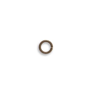 May include: A small, gold-toned jump ring with a twisted design.