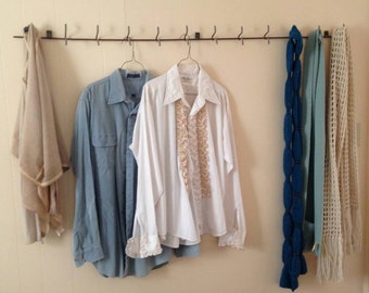 Scraping to upcycle a rustic, industrial coatrack