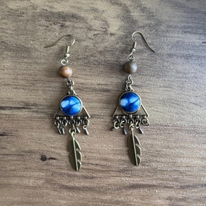 Boho Indigo Earrings – Handmade Tribal Jewelry with Natural Indigo-Dyed Fabric and Feather Charm