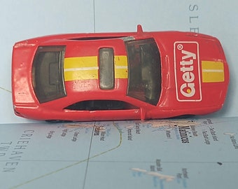 Hot Wheels Getty 1990  Vintage Mattel Bright Red with Yellow Stripe