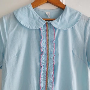 Peter Pan Collar Short Sleeve House Dress Tuxedo Style Ruffle Rick Rack Trim and Embroidery Pocket Hidden Button Closure Modern Medium Large