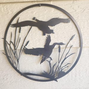 Oche e tife, decorazioni rustiche da 24" di arte da giardino personalizzata, anatre in metallo con oca volante rustica