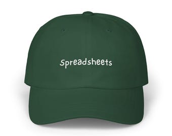 May include: A dark green baseball cap with the word "Spreadsheets" embroidered in white across the front. The cap has a curved brim and a structured crown, suitable for casual wear.