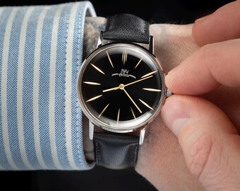 Raro orologio da polso meccanico vintage Luch "Ray" degli anni '80 con movimento 2209, design classico dell'era sovietica, orologio unisex a carica manuale, regalo perfetto.