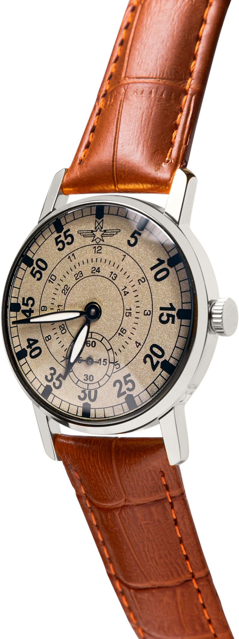 May include: A silver-cased wristwatch with a tan face and brown leather band. The watch face features black numerals and a subdial. The brown leather band is stitched with orange thread.