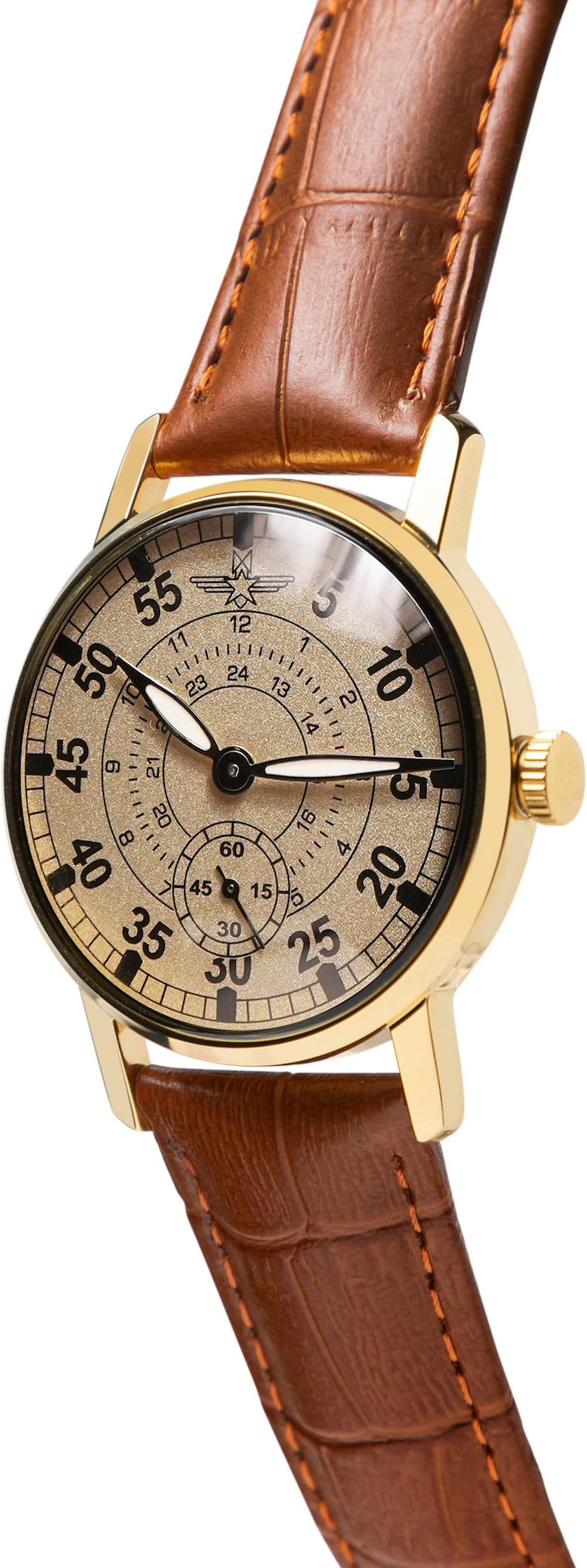 May include: A gold-toned wristwatch with a brown leather band. The watch face features black numerals and a subdial. The band is stitched with orange thread. The watch has a classic, vintage aesthetic.