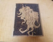Wood trinket jewelry box with hand burned lion head design on front and back, oak finish, animal pattern lining. 7 x 10 x 2 inches.