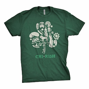 May include: Green t-shirt with a white graphic in the shape of a shamrock, featuring Chicago landmarks and food icons. The text "CHI*RISH" is printed in green at the bottom of the shirt.
