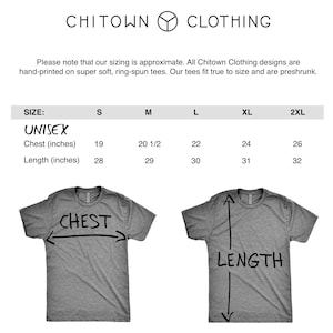 May include: Size chart for unisex t-shirts showing chest and length measurements in inches. The chart includes sizes S, M, L, XL, and 2XL.  The chart is displayed on a white background with a gray t-shirt illustration.