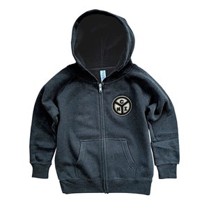 May include: Black zippered hoodie with a gray and white circular patch featuring the letters "CN" and "IX" inside a circle.