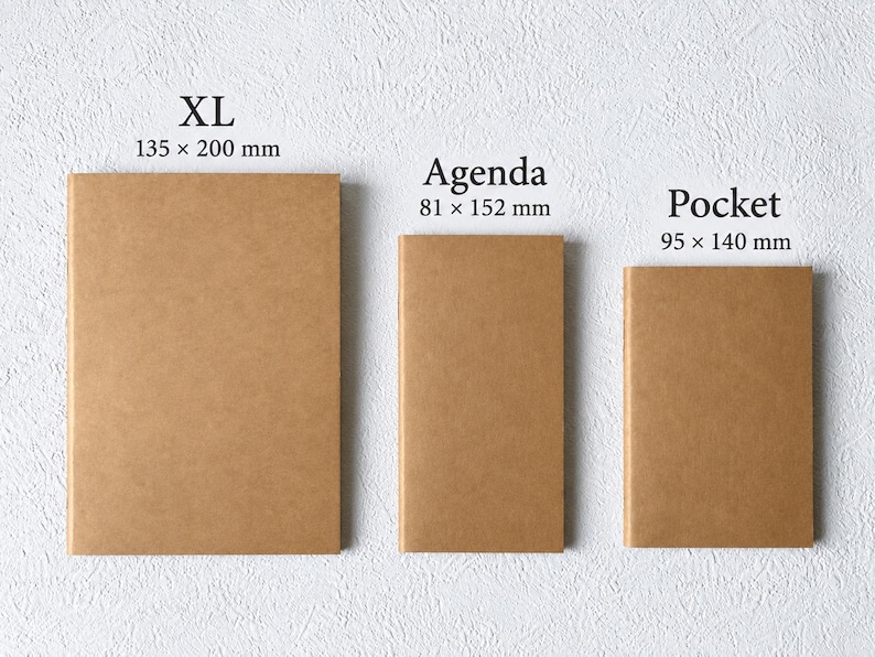 May include: Three rectangular brown notebooks labeled XL, Agenda, and Pocket. The XL notebook measures 135 x 200 mm, the Agenda notebook measures 81 x 152 mm, and the Pocket notebook measures 95 x 140 mm. Each notebook has a plain, solid brown cover.